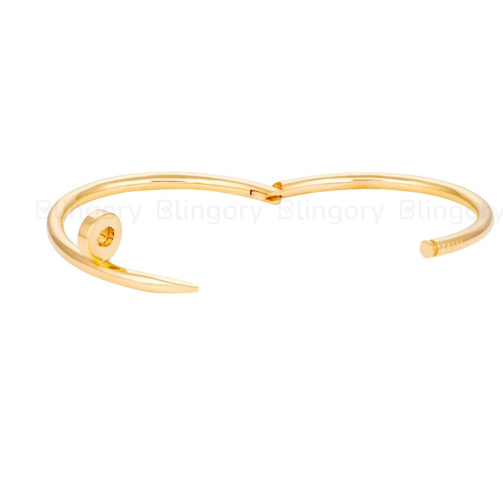 Nail bracelet 18k plain gold , 4mm thickness .